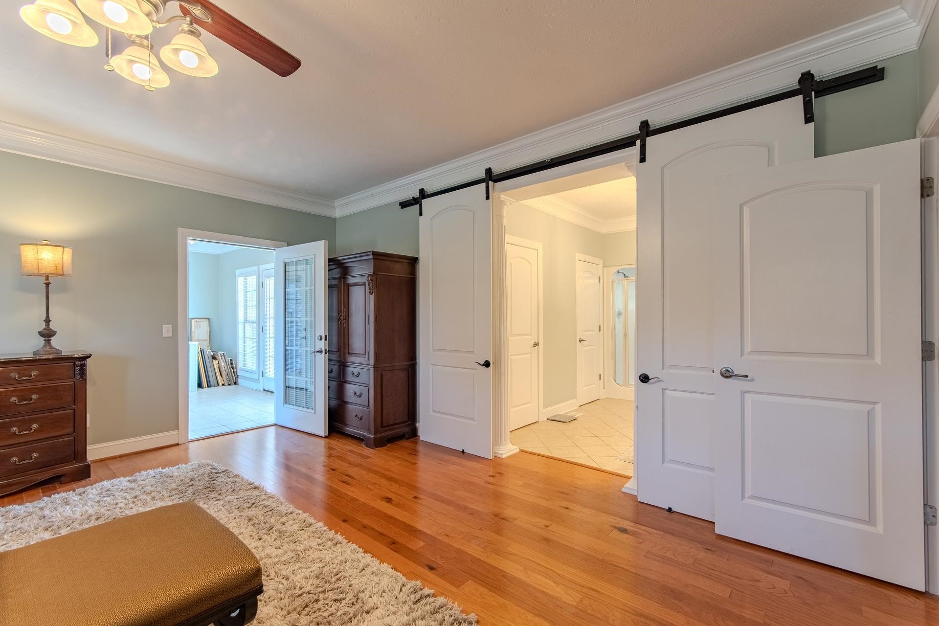 6170 Highway 226 Savannah, TN 38372 - Photo 16 of 40 a spacious bedroom with a bed and wooden floor