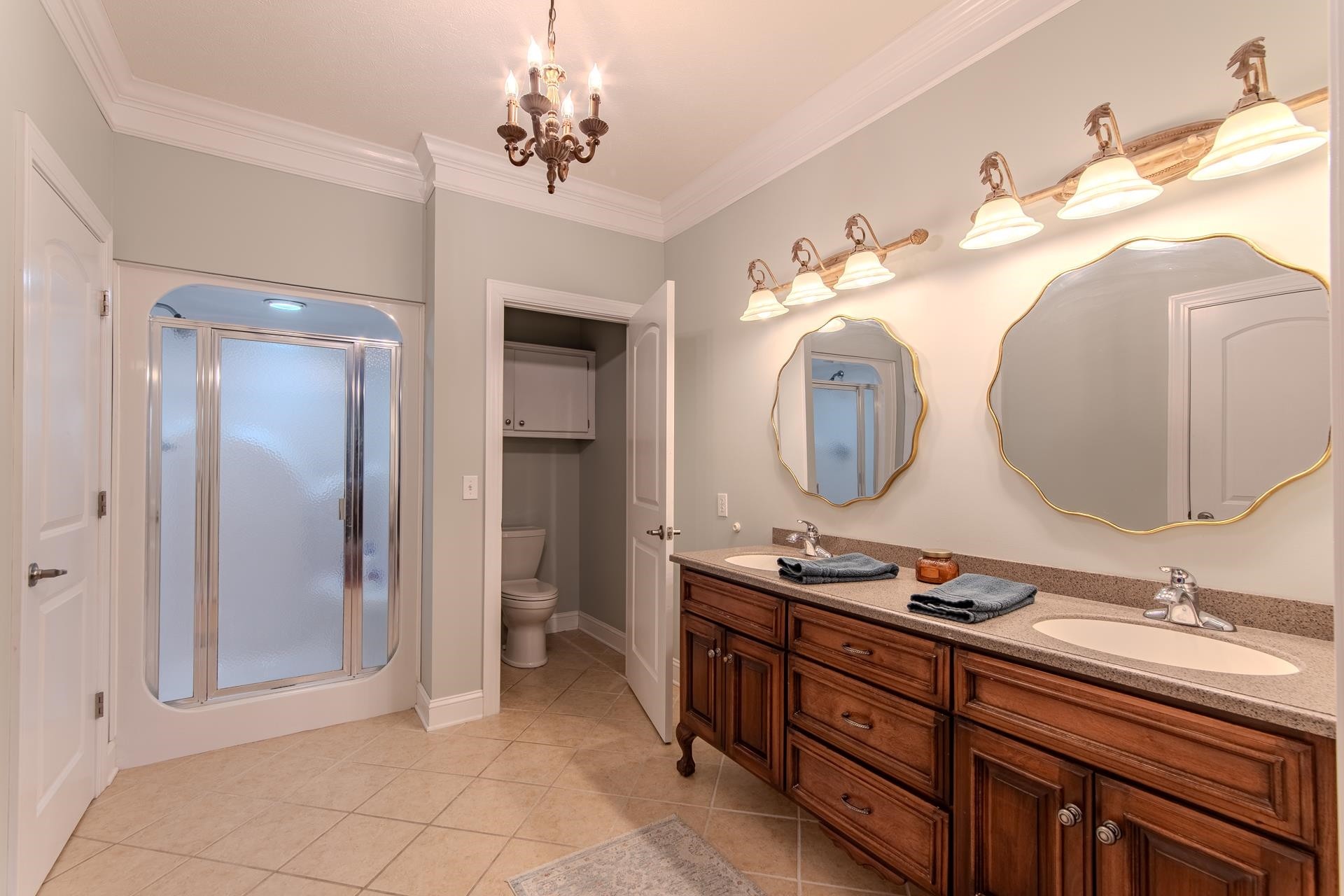 6170 Highway 226 Savannah, TN 38372 - Photo 17 of 40 a bathroom with a double vanity sink and a mirror