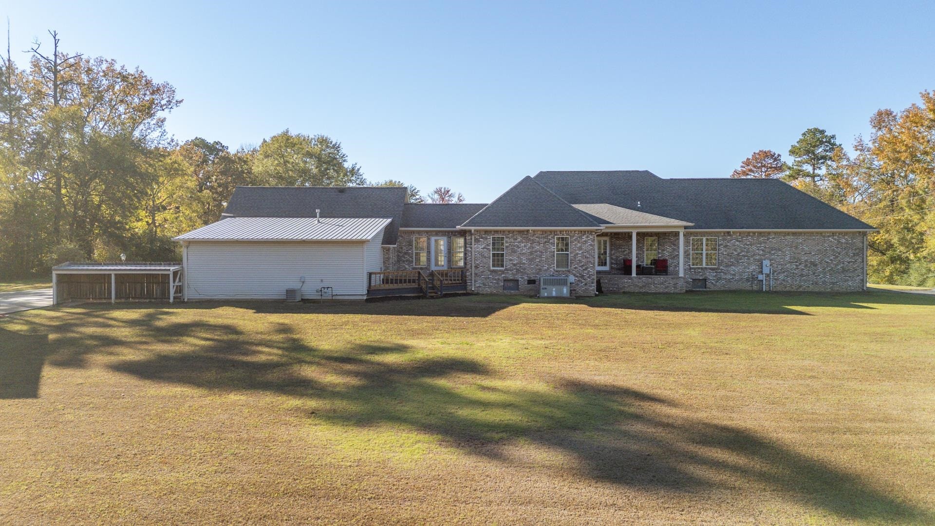 6170 Highway 226 Savannah, TN 38372 - Photo 37 of 40 a front view of a house with a swimming pool
