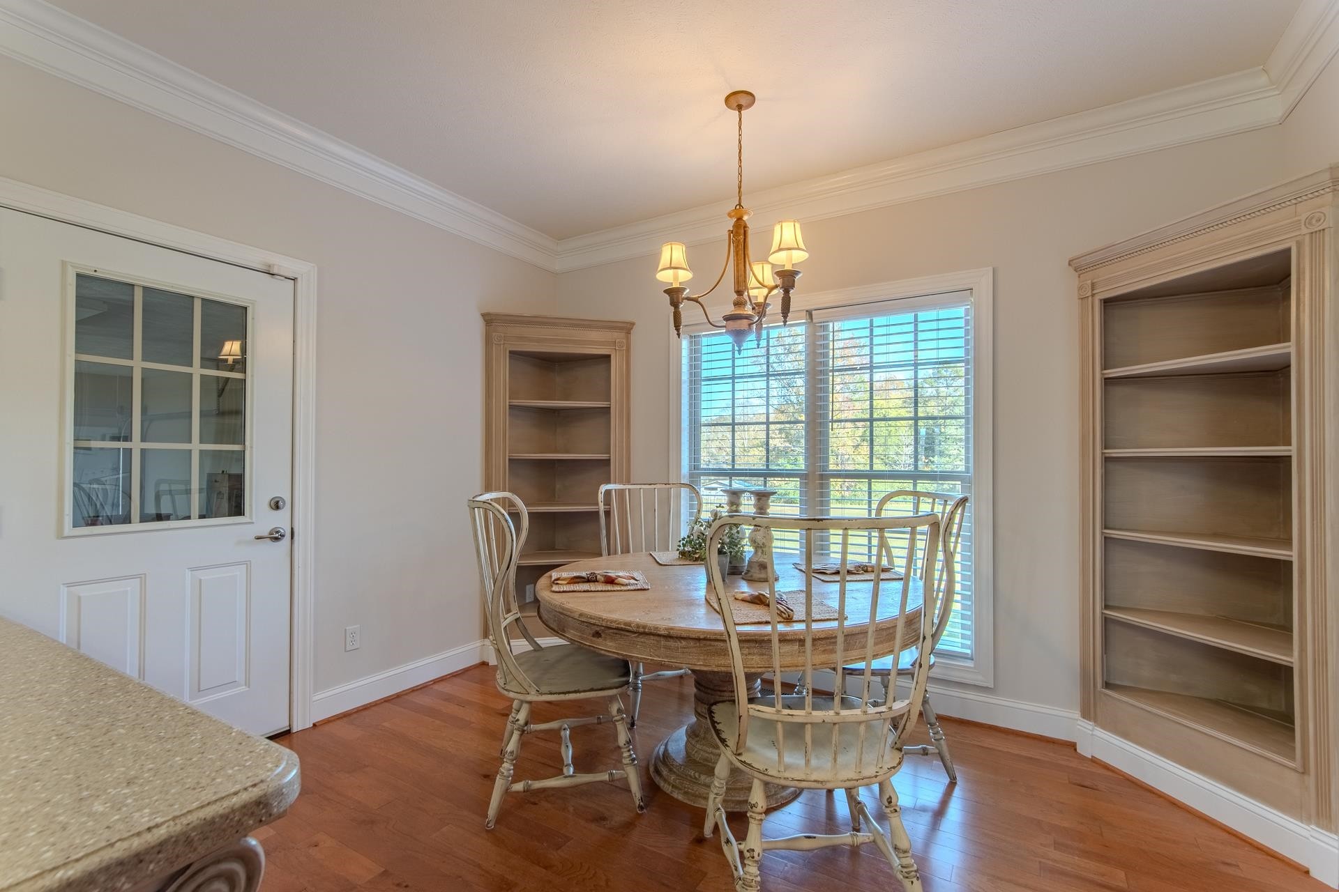 6170 Highway 226 Savannah, TN 38372 - Photo 8 of 40 a view of a dining room with furniture window and wooden floor