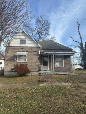a front view of a house with garage
