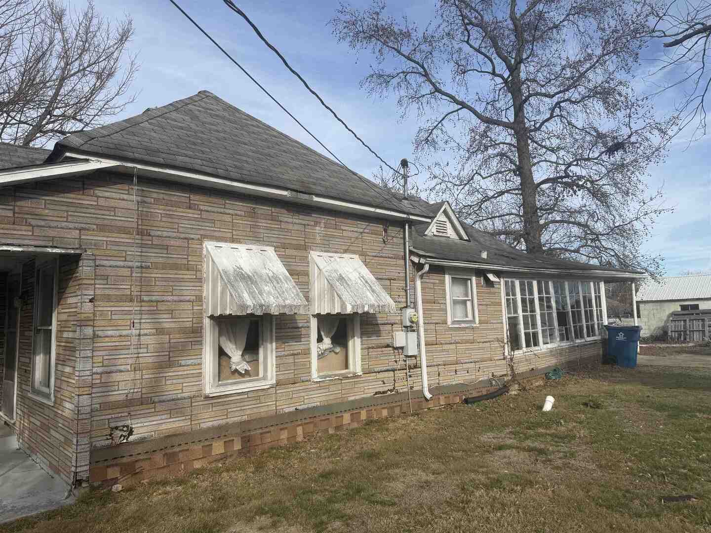 404 South Thomas Street Christopher, IL 62822 - Photo 13 of 16 a front view of a house with a garage