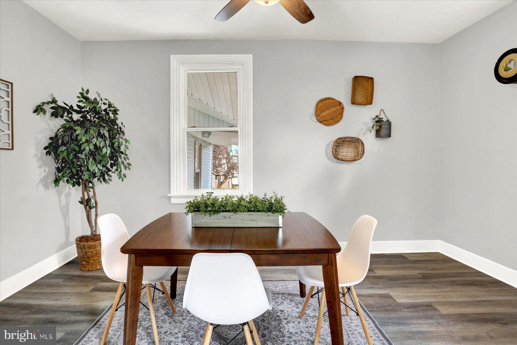 497 State Street Enola, PA 17025 - Photo 14 of 47 a view of a dining room with furniture and wooden floor