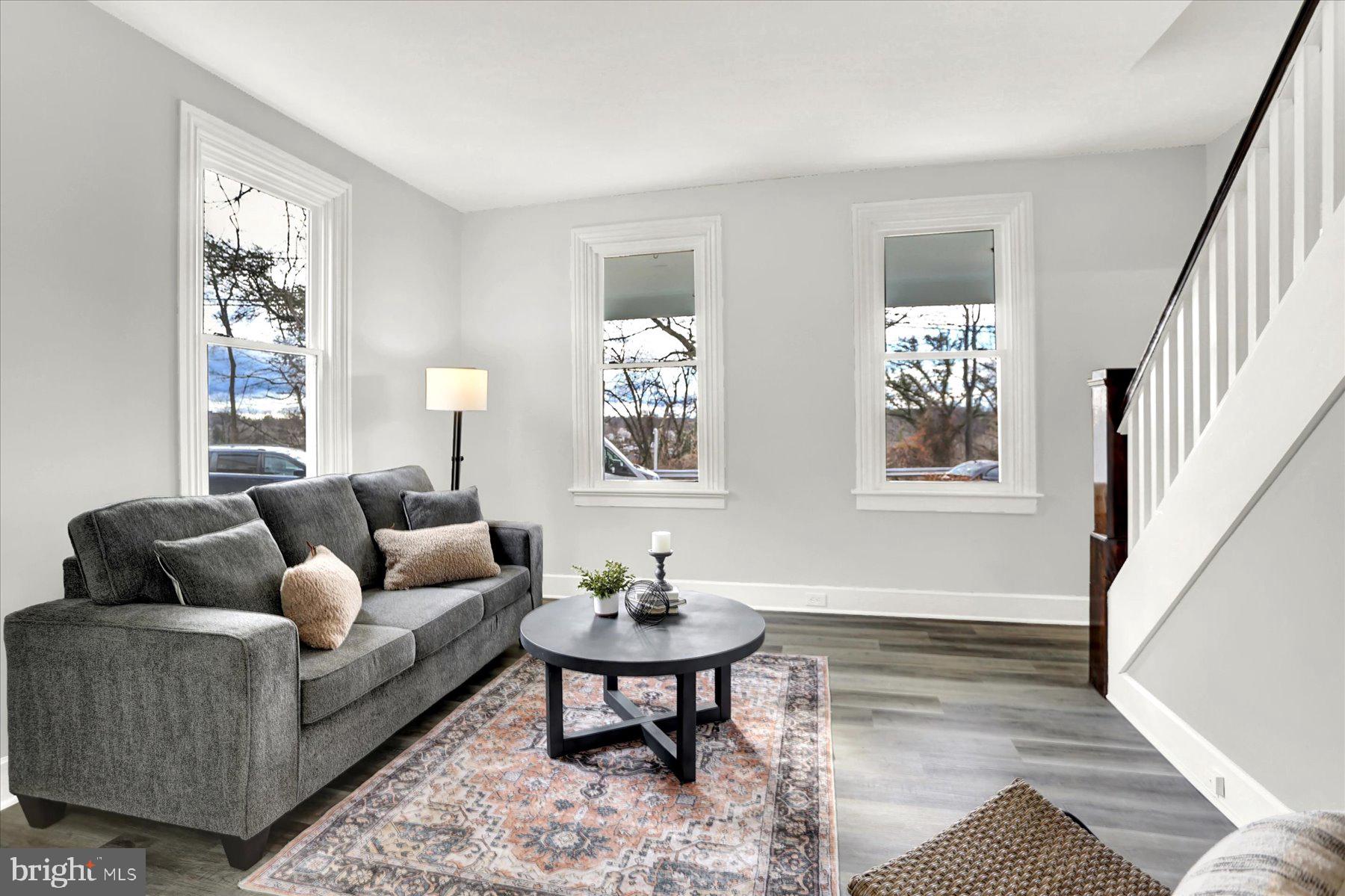 497 State Street Enola, PA 17025 - Photo 15 of 47 a living room with furniture and windows