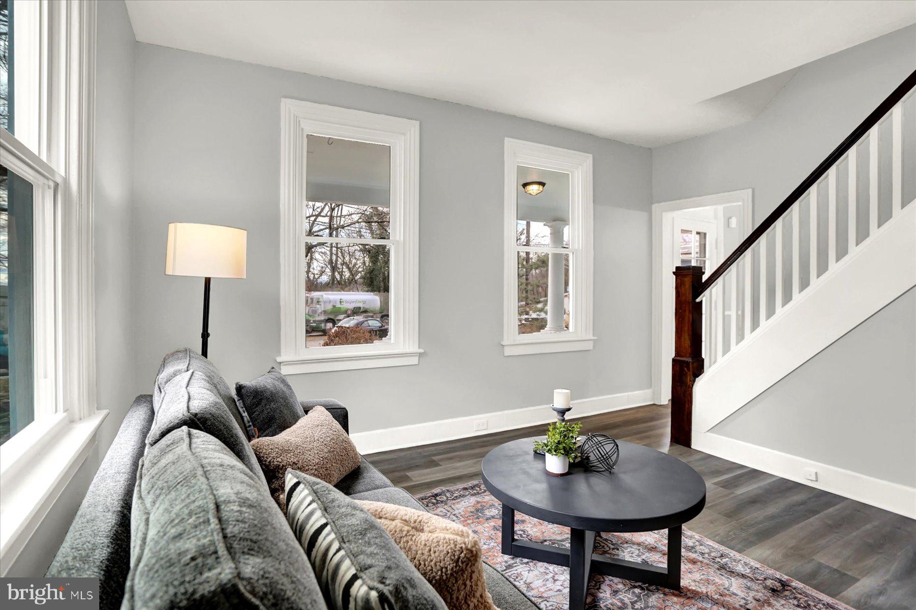 497 State Street Enola, PA 17025 - Photo 16 of 47 a living room with furniture and a lamp