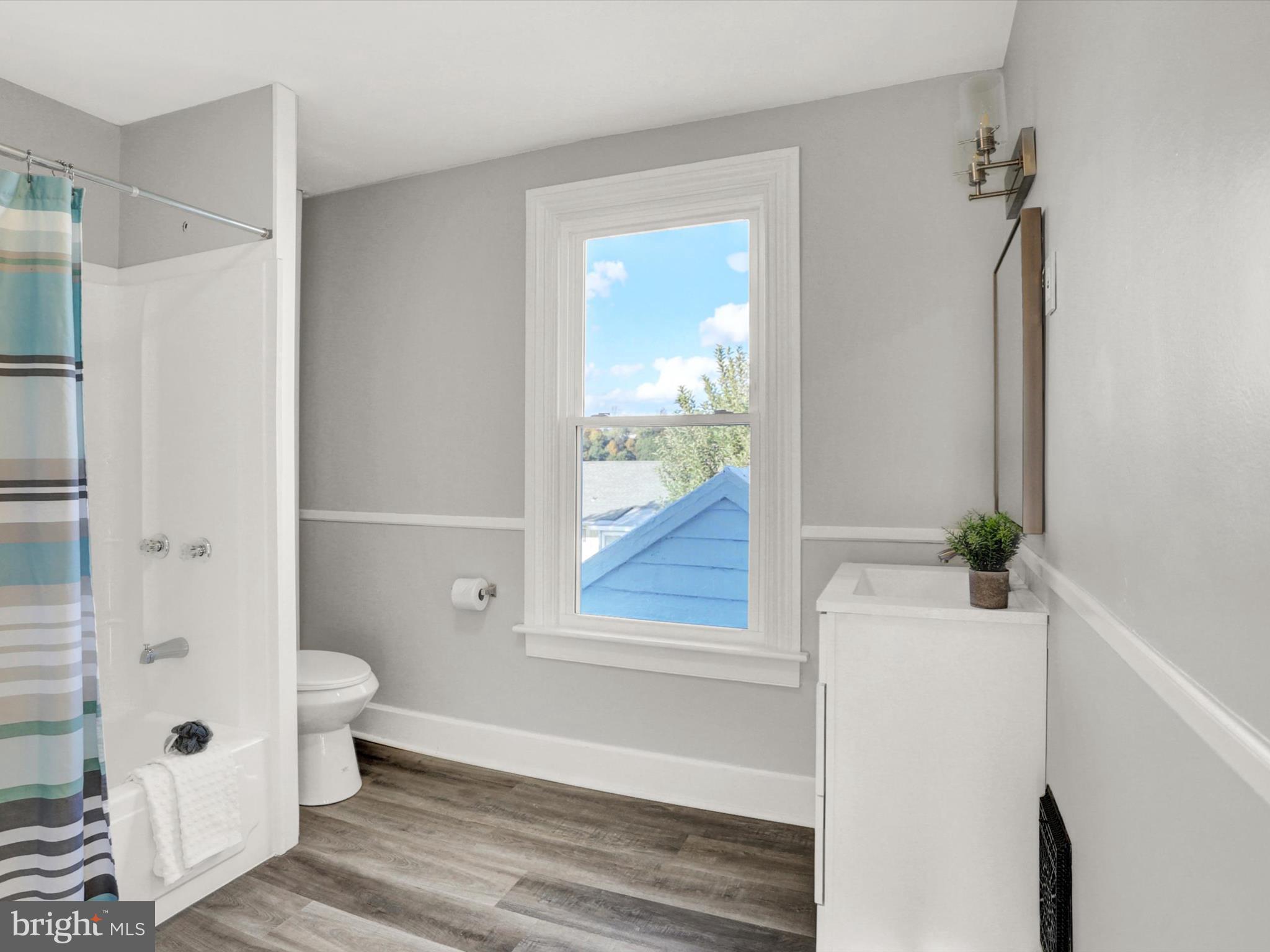 497 State Street Enola, PA 17025 - Photo 20 of 47 a bathroom with a bathtub and a toilet