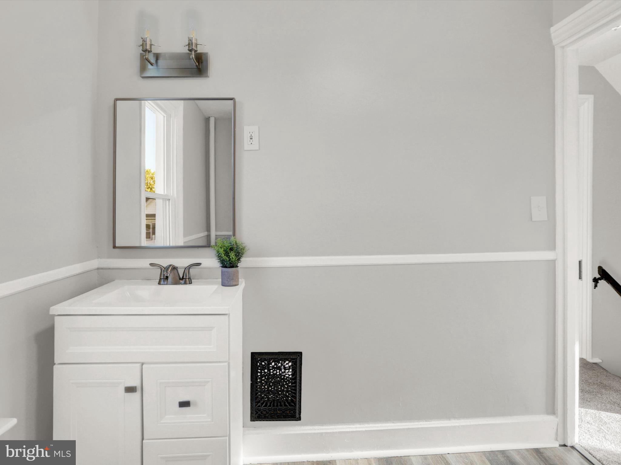 497 State Street Enola, PA 17025 - Photo 22 of 47 a bathroom with a sink and a mirror