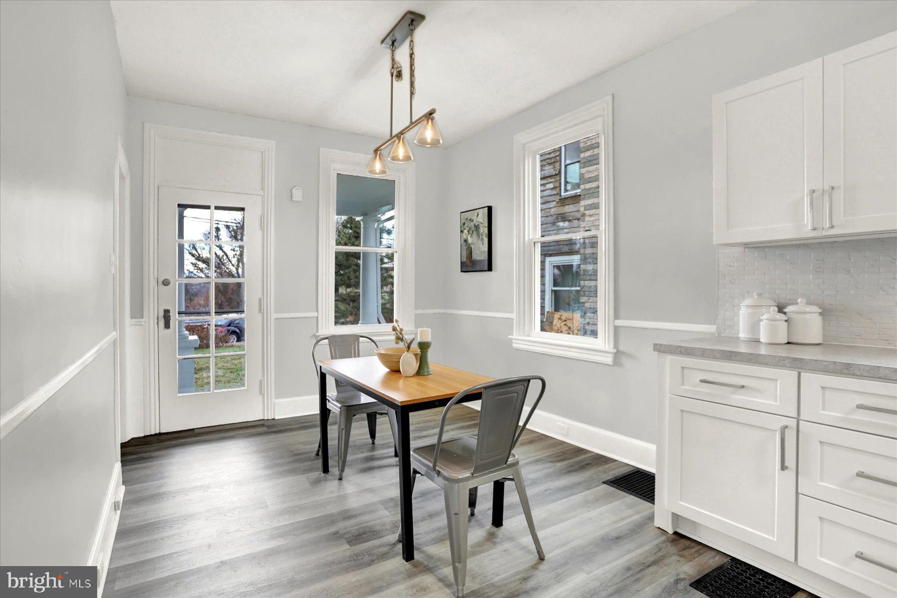 497 State Street Enola, PA 17025 - Photo 3 of 47 a view of a dining room with furniture and wooden floor