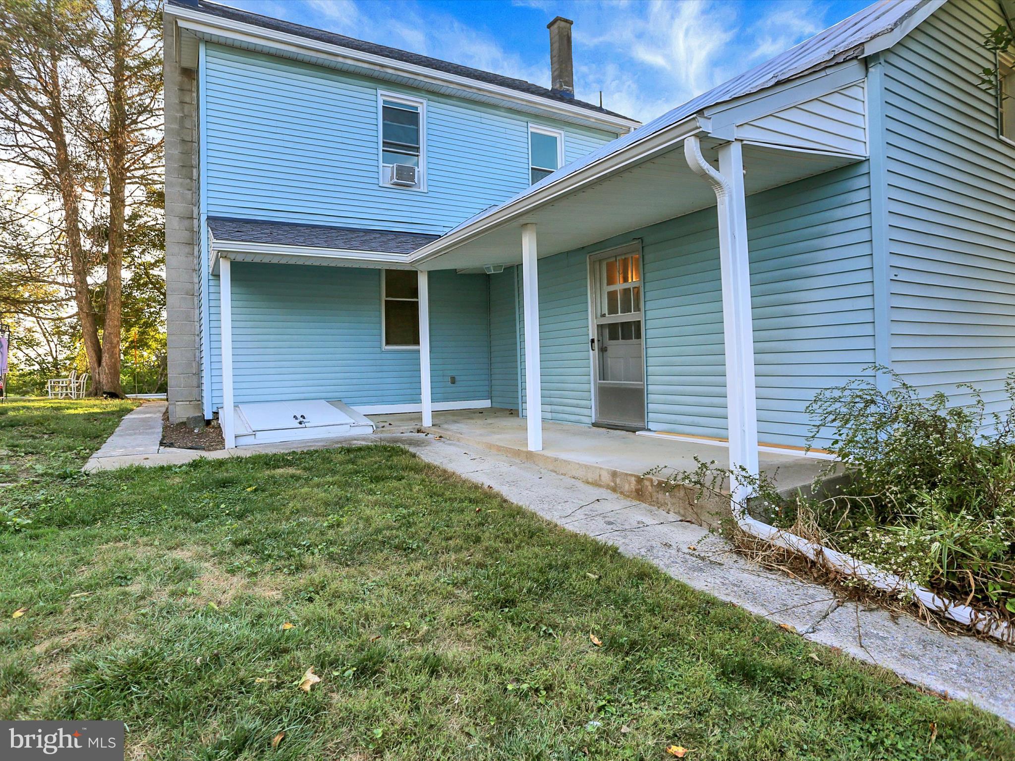 497 State Street Enola, PA 17025 - Photo 33 of 47 a front view of a house with garden
