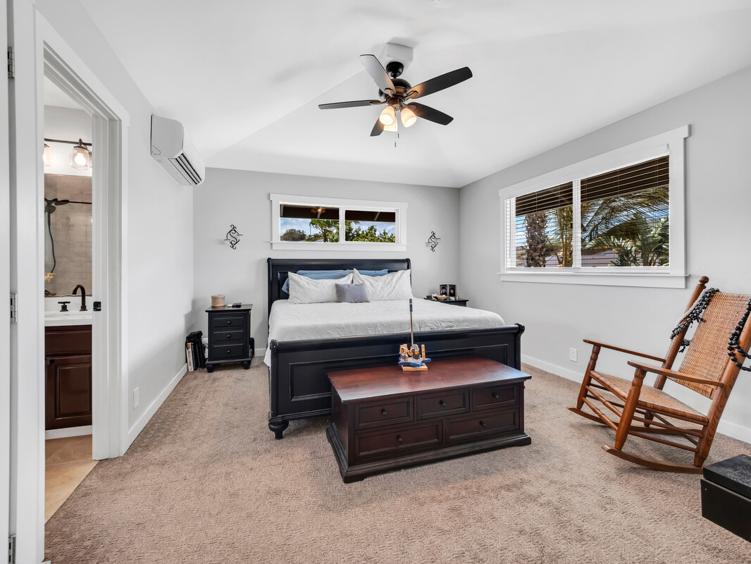 68-3679 Kokee Street Waikoloa, HI 96738 - Photo 12 of 28 a bedroom with furniture and a window