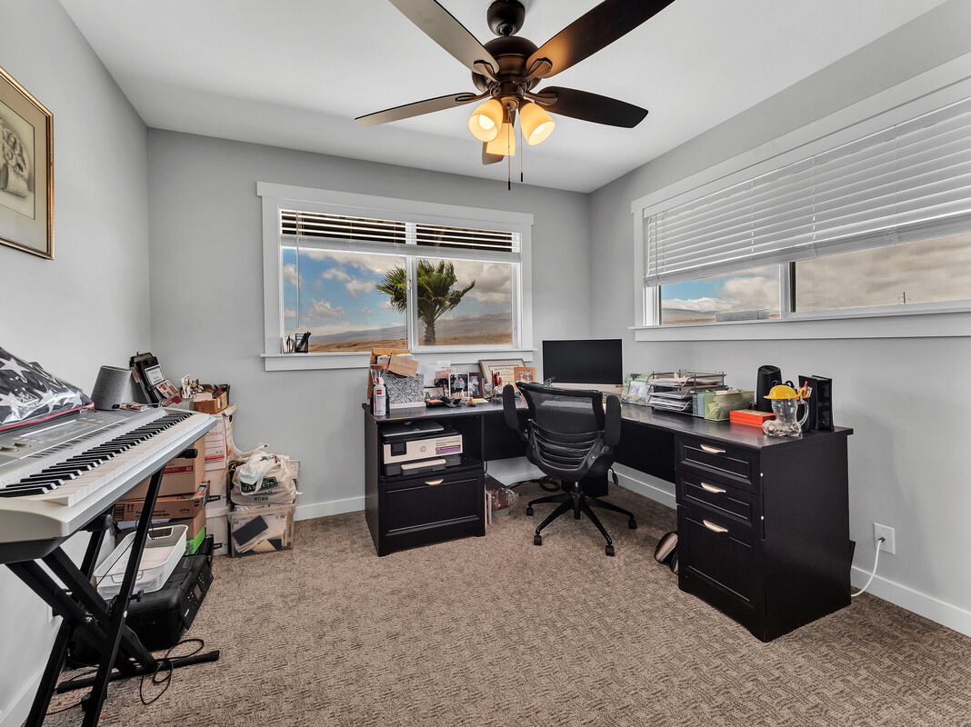 68-3679 Kokee Street Waikoloa, HI 96738 - Photo 18 of 28 a view of a workspace with furniture and a window