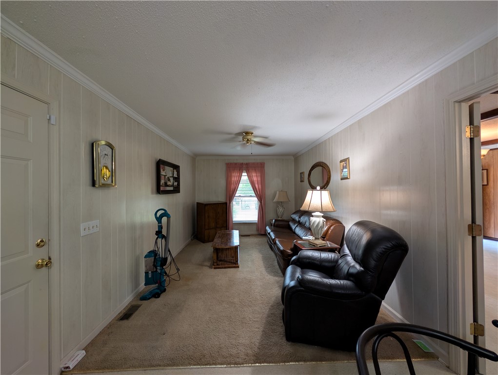 1000 Hickory Lane Anderson, SC 29624 - Photo 24 of 37 This inviting living room offers comfort and a relaxed atmosphere for daily living.