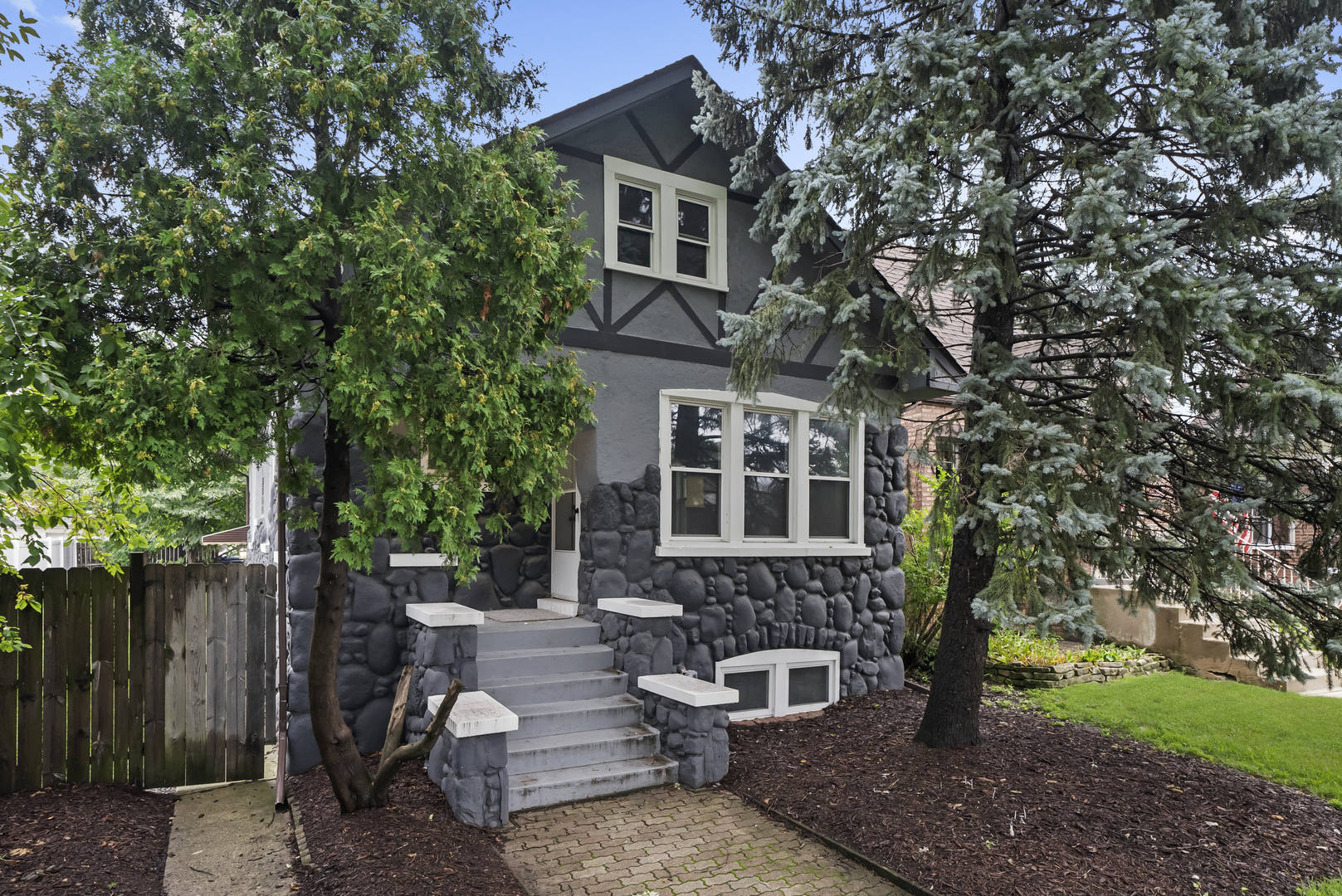 3229 Maple Avenue Brookfield, IL 60513 - Photo 2 of 14 a front view of a house with outdoor seating