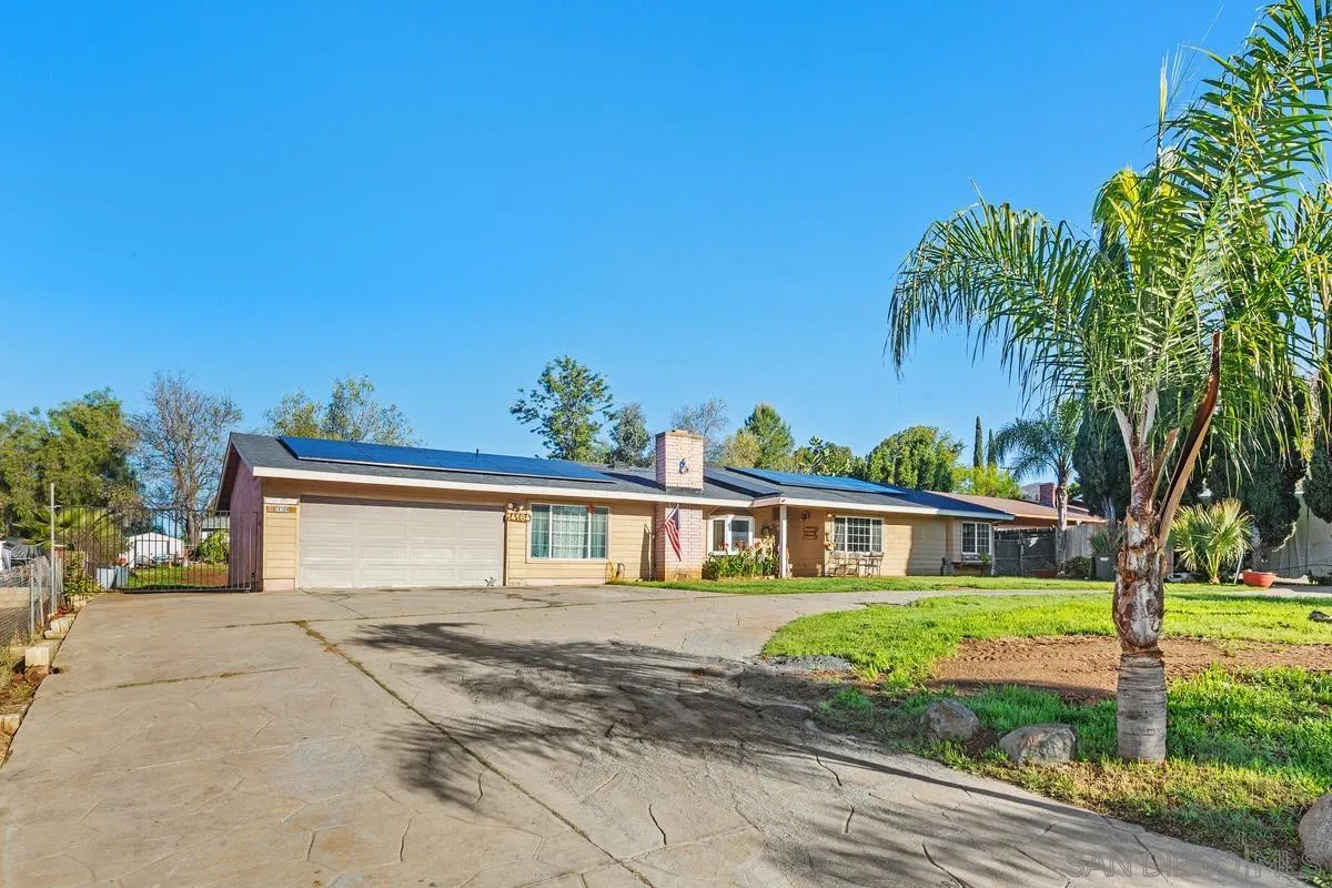 14164 Lyons Valley Road Jamul, CA 91935 - Photo 2 of 33 a front view of a house with a garden