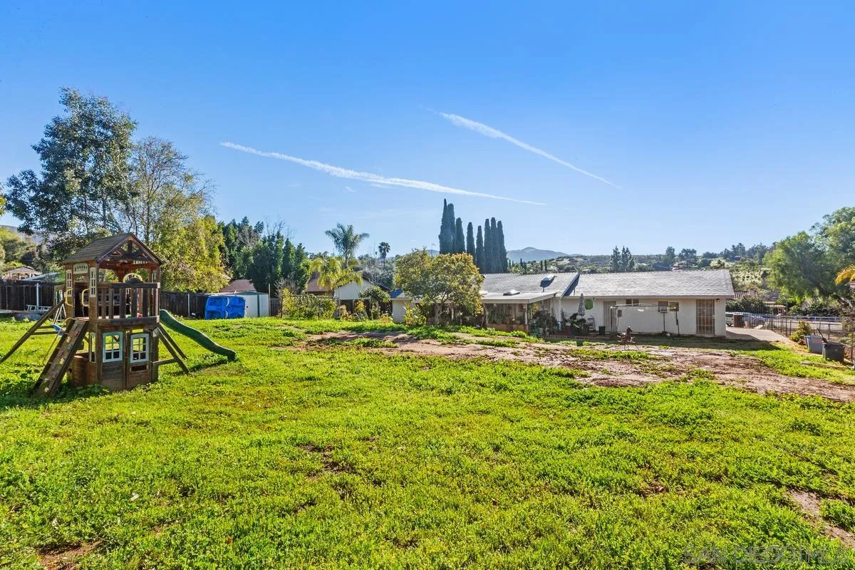 14164 Lyons Valley Road Jamul, CA 91935 - Photo 32 of 33 a view of a house with a yard and sitting area