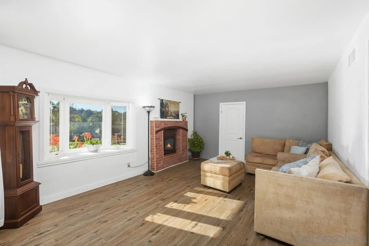 14164 Lyons Valley Road Jamul, CA 91935 - Photo 6 of 33 a living room with furniture and a window