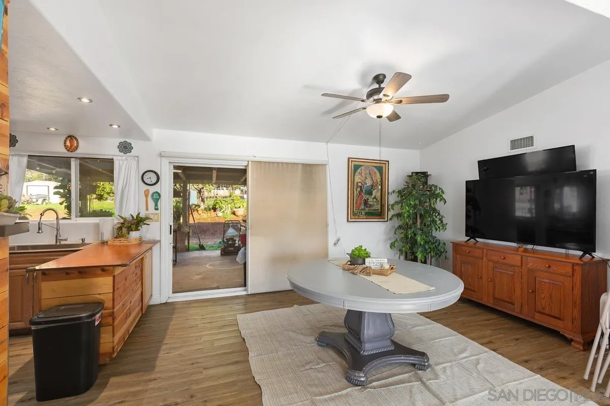 14164 Lyons Valley Road Jamul, CA 91935 - Photo 9 of 33 a living room with furniture and a flat screen tv