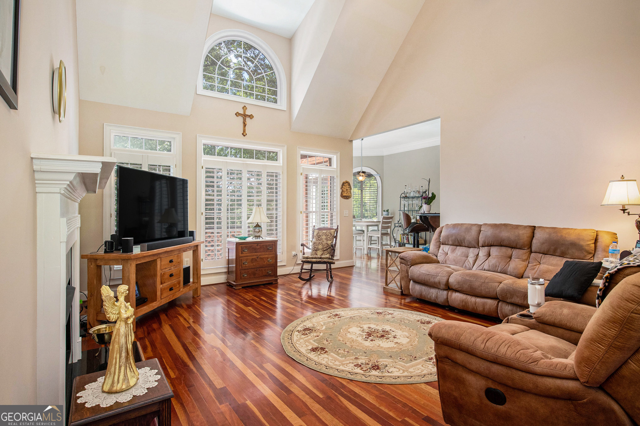 131 Winesap Way Clarkesville, GA 30523 - Photo 11 of 65 a living room with furniture a flat screen tv and a large window