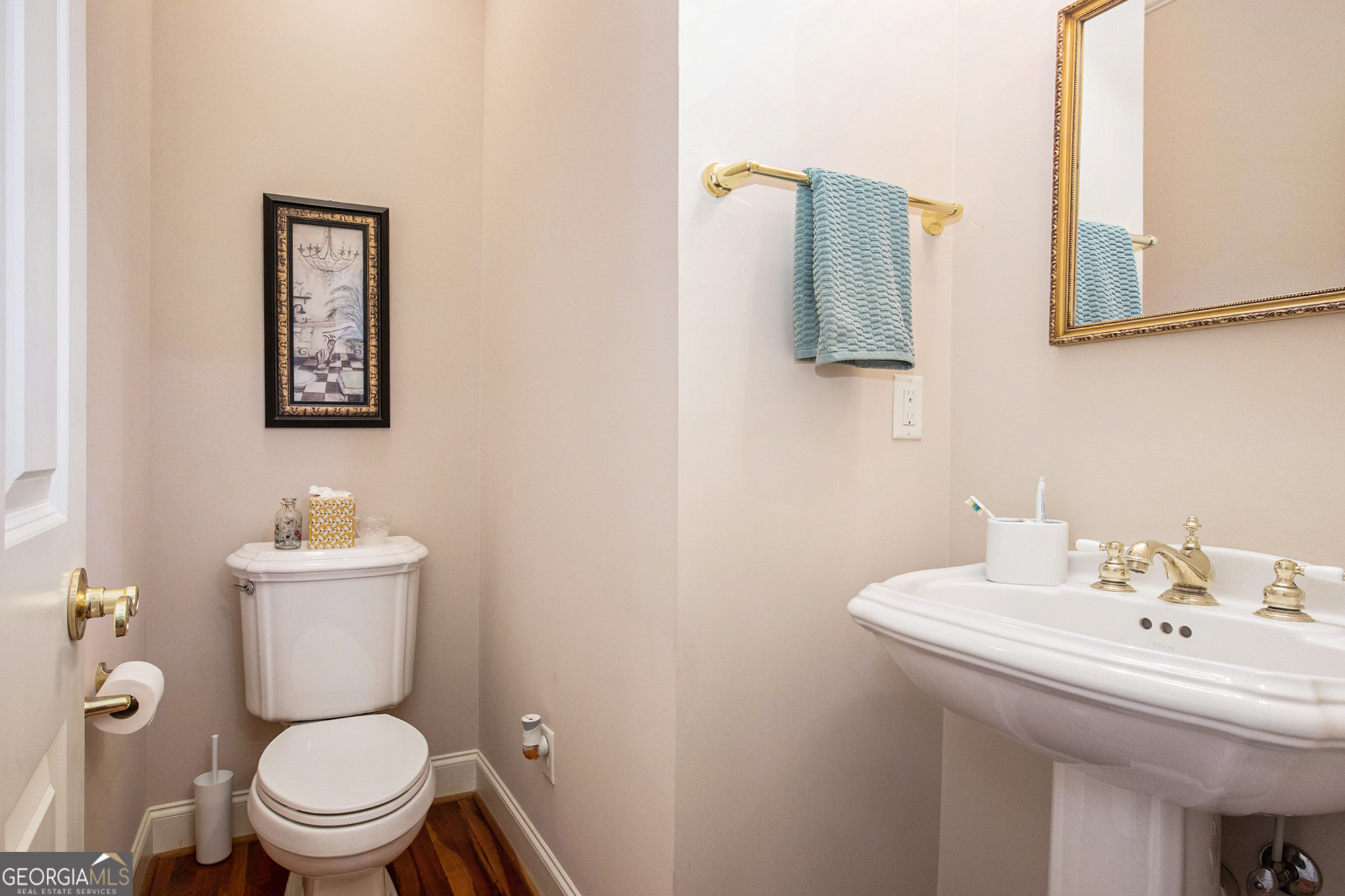 131 Winesap Way Clarkesville, GA 30523 - Photo 18 of 65 a bathroom with a toilet a sink and mirror