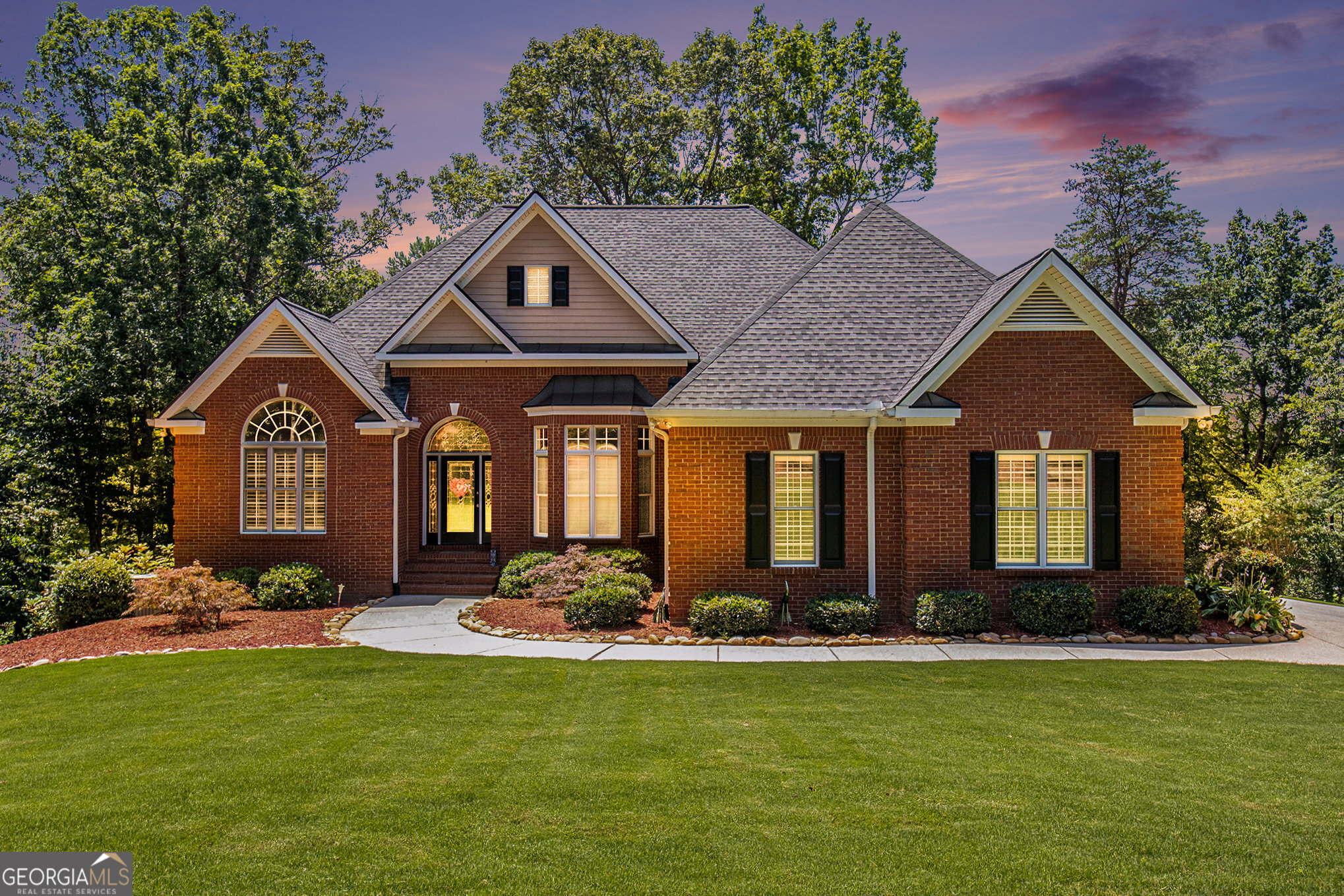 131 Winesap Way Clarkesville, GA 30523 - Photo 2 of 65 a front view of a house with yard and green space