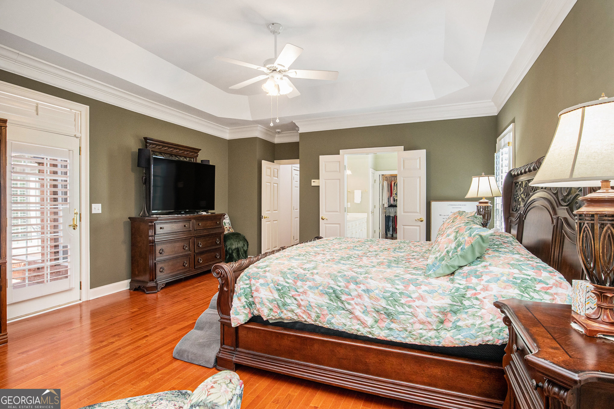 131 Winesap Way Clarkesville, GA 30523 - Photo 21 of 65 a bedroom with a bed and a flat screen tv