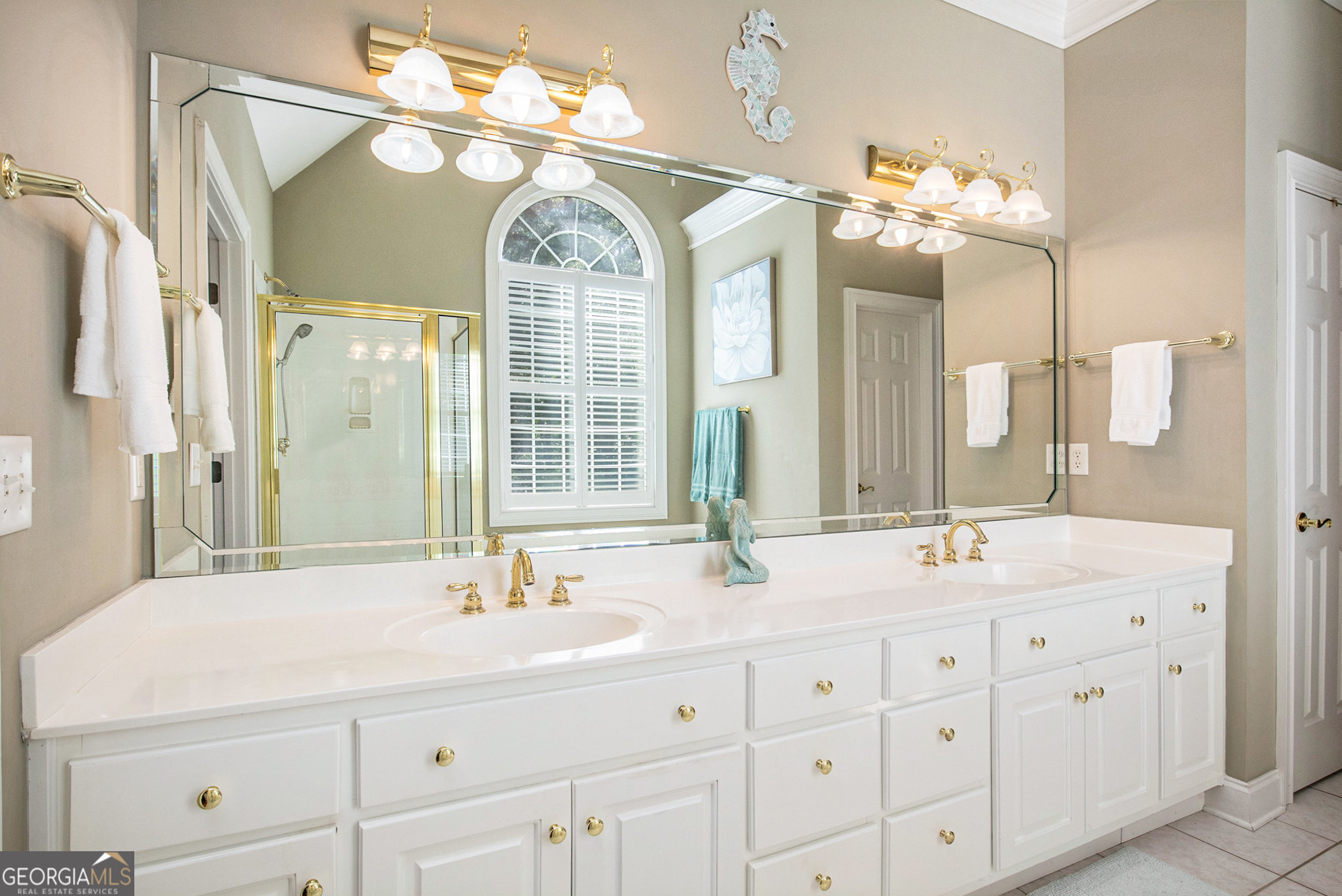 131 Winesap Way Clarkesville, GA 30523 - Photo 23 of 65 a bathroom with a double vanity sink mirror and