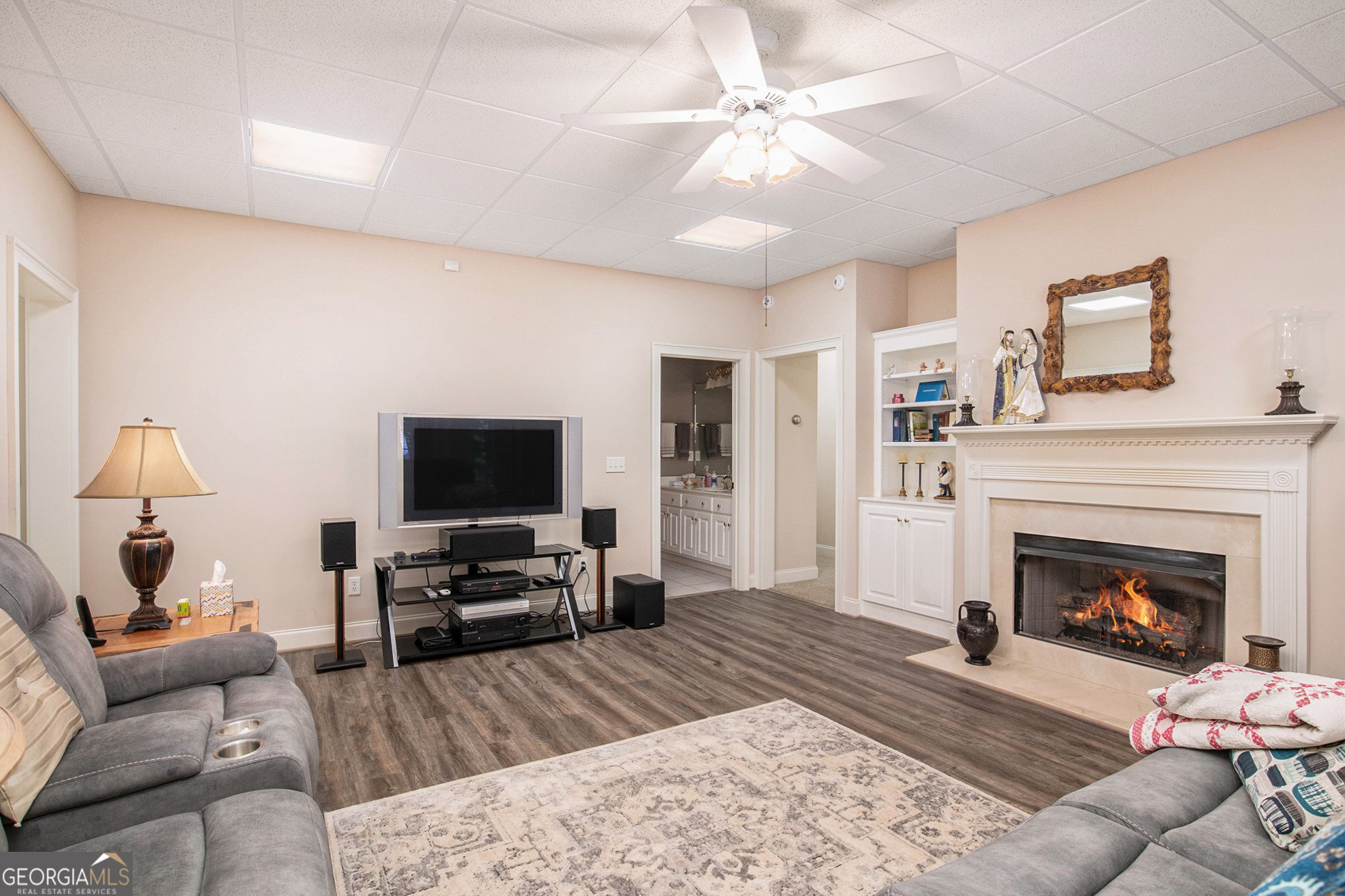 131 Winesap Way Clarkesville, GA 30523 - Photo 31 of 65 a living room with furniture and a fireplace or television