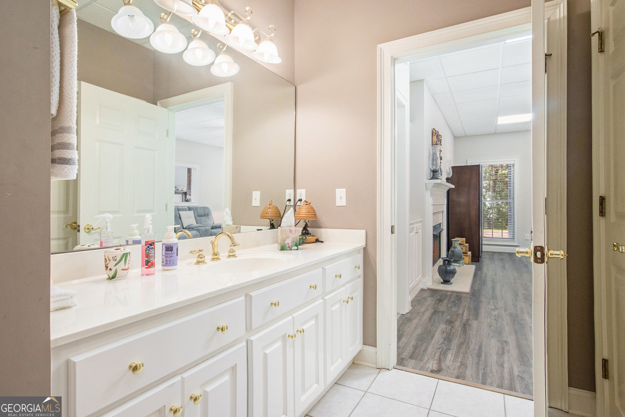 131 Winesap Way Clarkesville, GA 30523 - Photo 33 of 65 a en suite bathroom with a sink double vanity and mirror