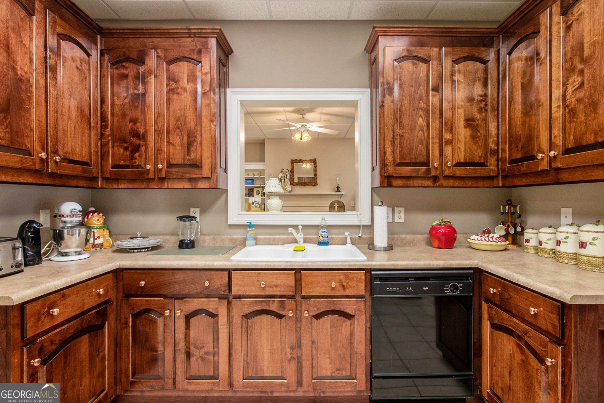 131 Winesap Way Clarkesville, GA 30523 - Photo 35 of 65 a kitchen with a sink a stove and cabinets