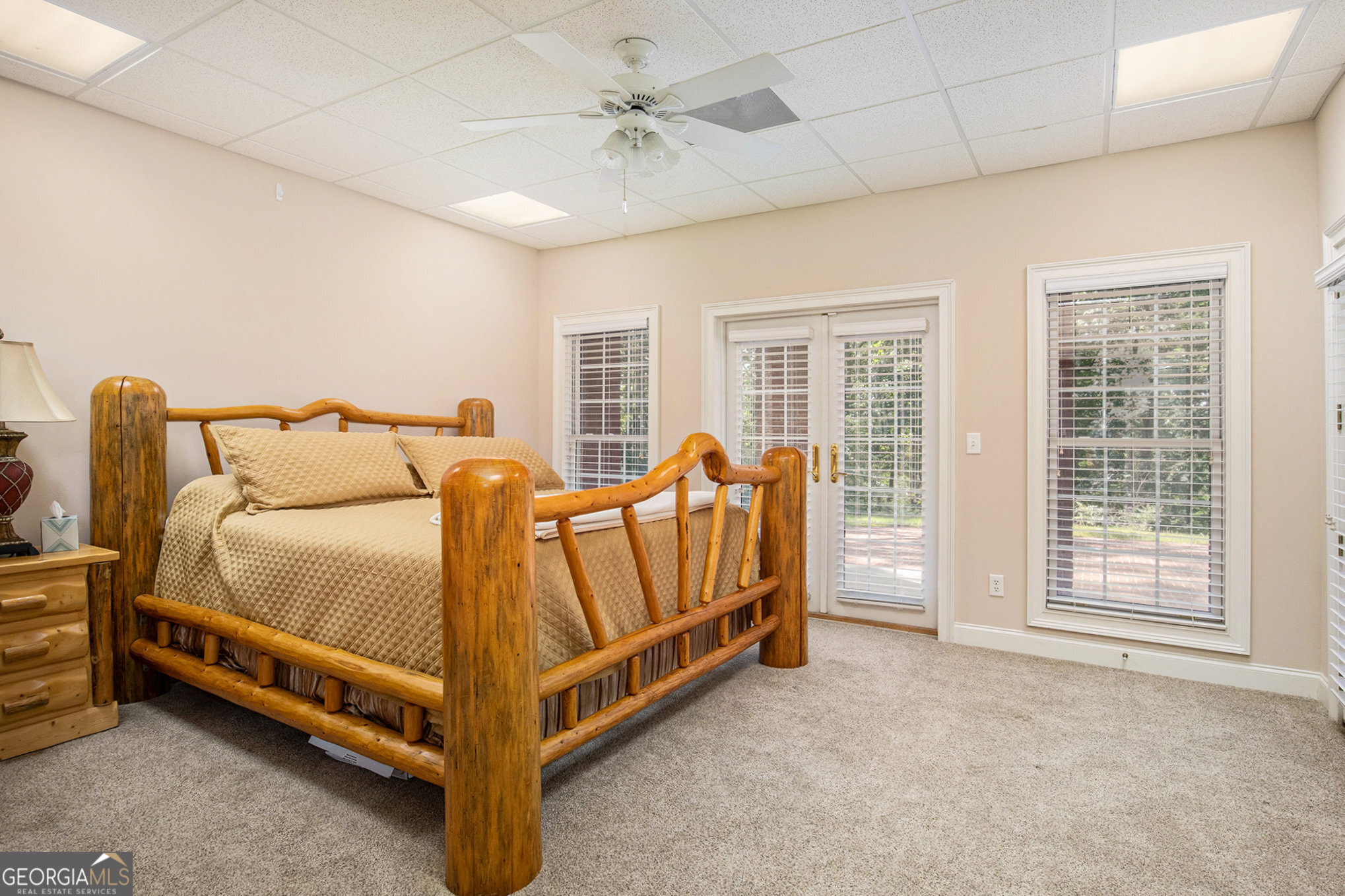 131 Winesap Way Clarkesville, GA 30523 - Photo 39 of 65 a bed room with a bed and a chair