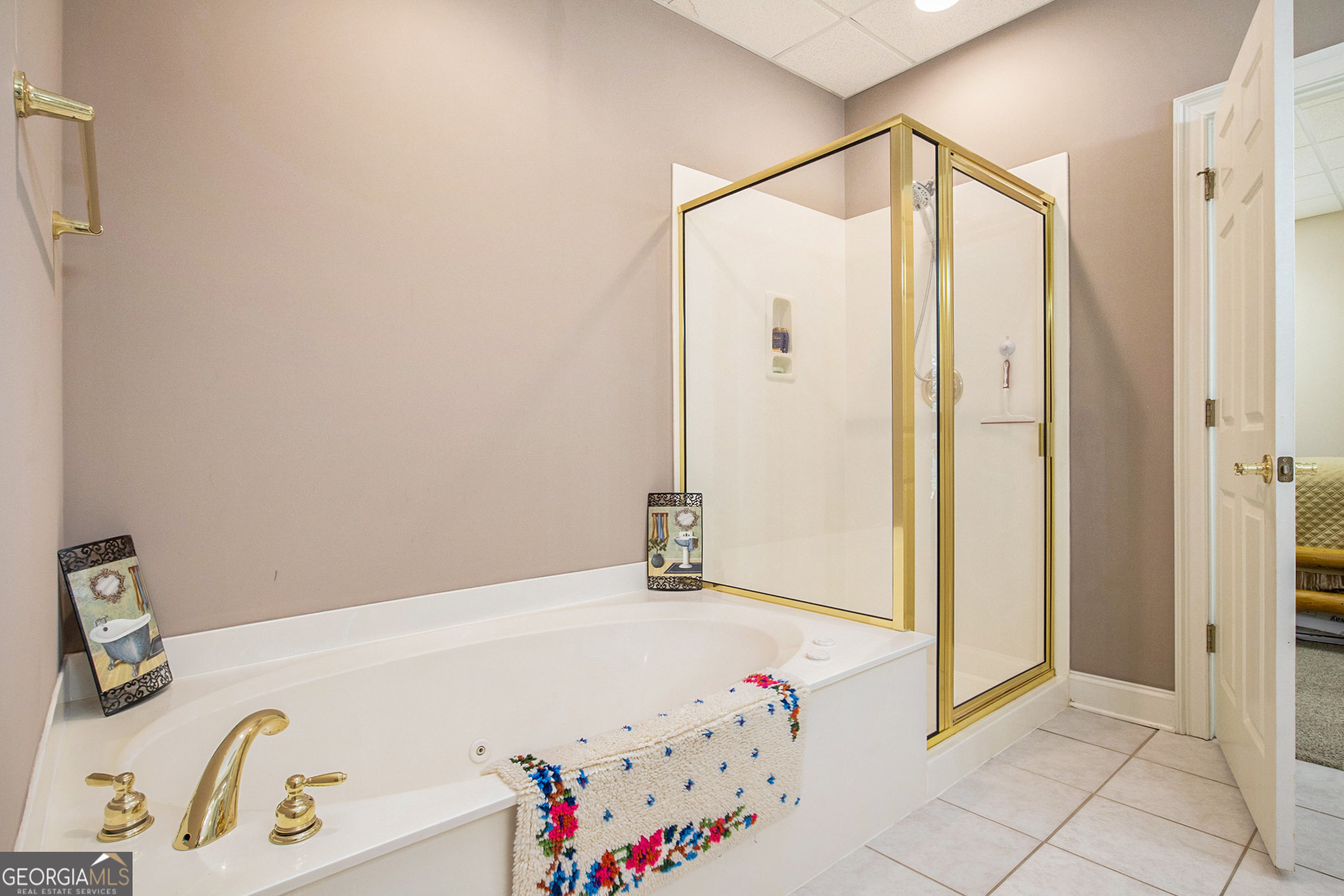 131 Winesap Way Clarkesville, GA 30523 - Photo 43 of 65 a bathroom with a tub and shower