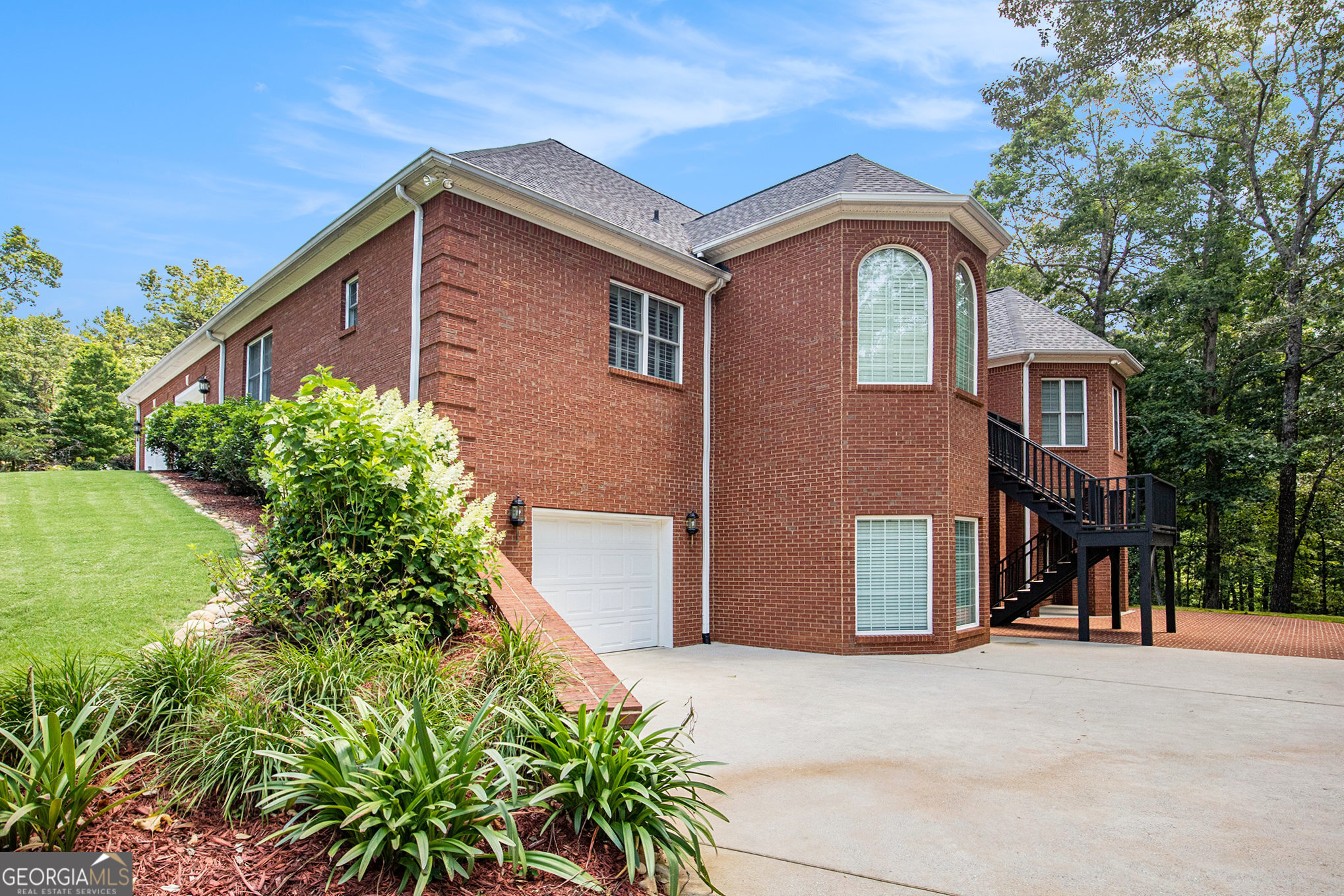 131 Winesap Way Clarkesville, GA 30523 - Photo 51 of 65 a front view of a house with garden