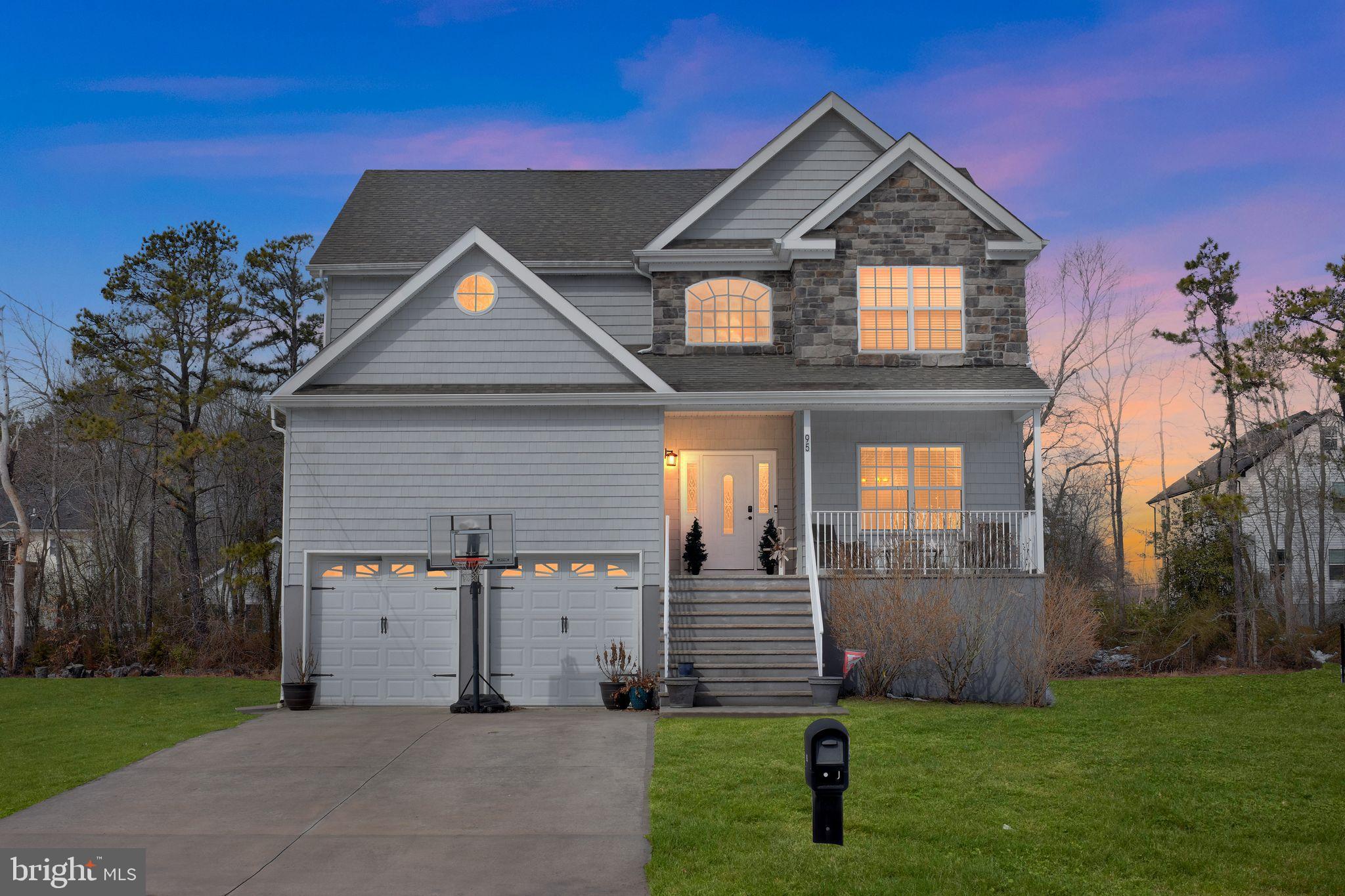 95 Savannah Road Manchester Township, NJ 08757 - Photo 2 of 37 a front view of a house with a yard