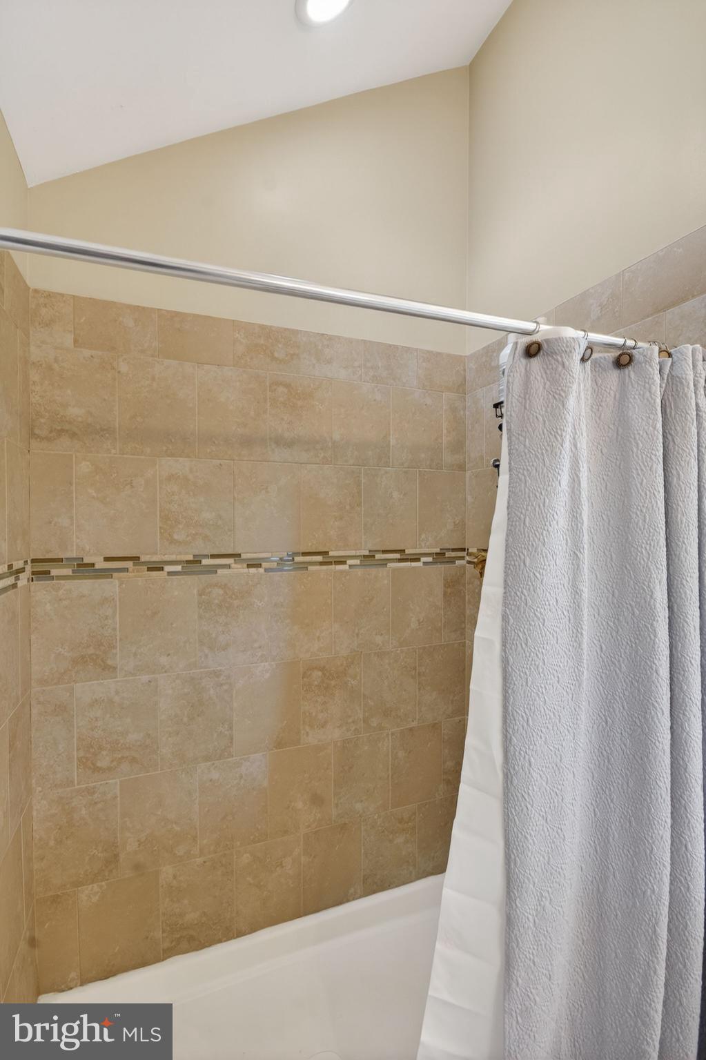 95 Savannah Road Manchester Township, NJ 08757 - Photo 23 of 37 a bathroom with a shower and a bath tub