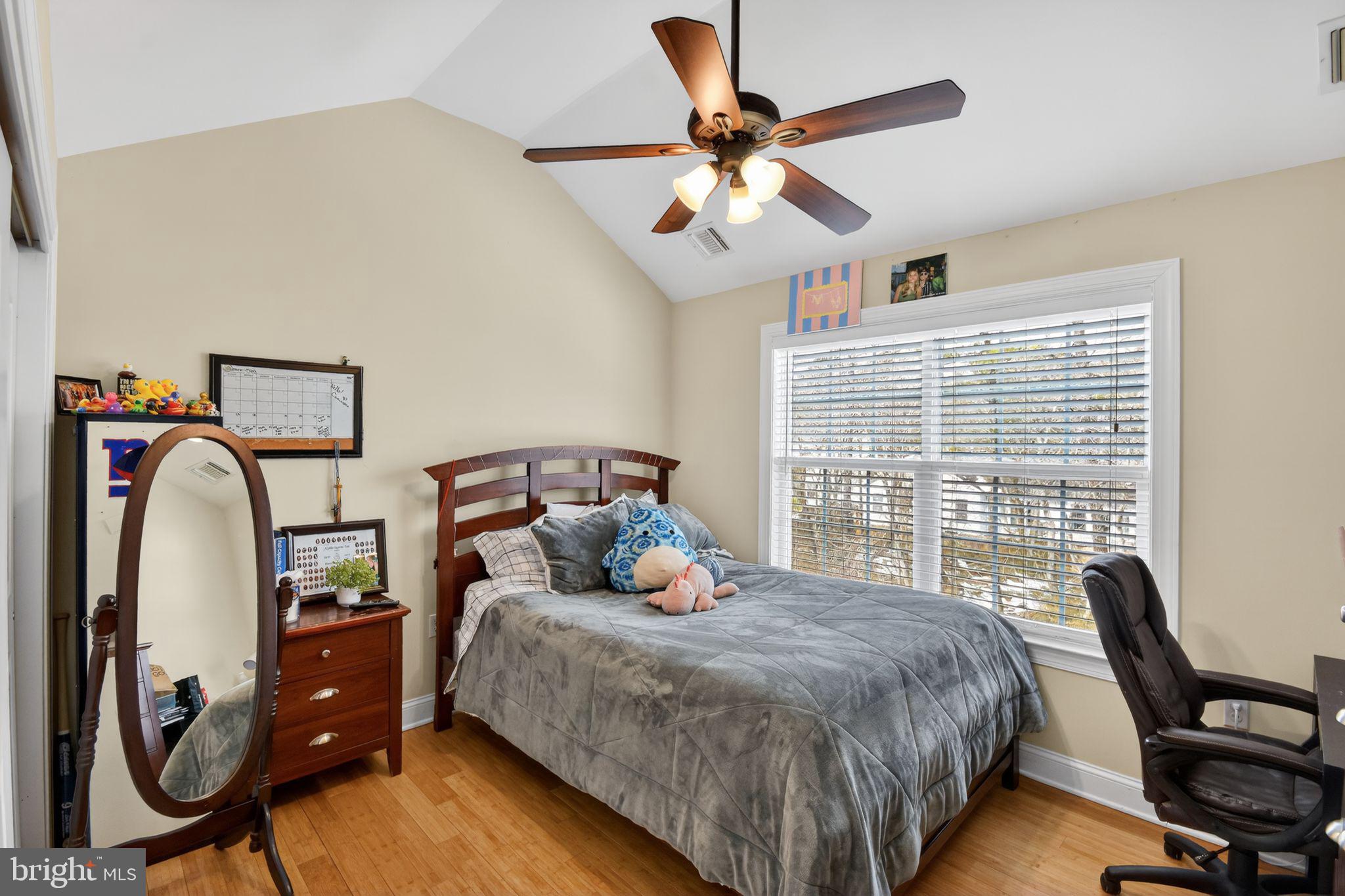 95 Savannah Road Manchester Township, NJ 08757 - Photo 24 of 37 a bedroom with a bed a desk and chair