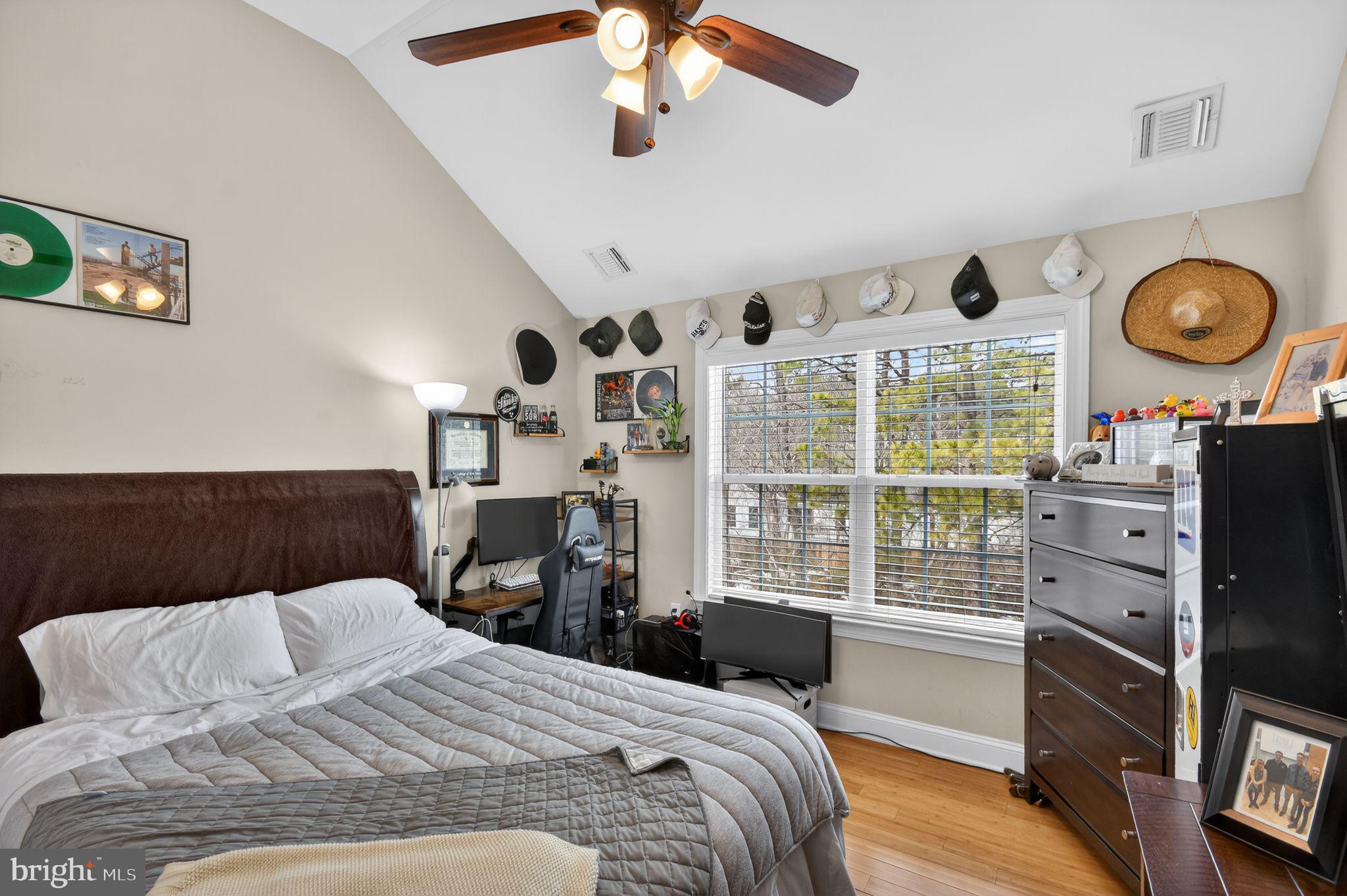 95 Savannah Road Manchester Township, NJ 08757 - Photo 25 of 37 a bedroom with a bed and a large window