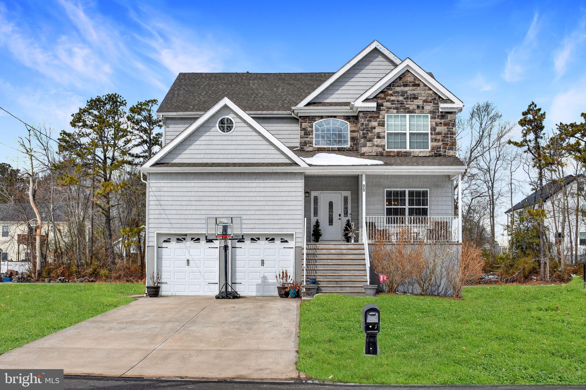 95 Savannah Road Manchester Township, NJ 08757 - Photo 35 of 37 a front view of a house with a yard