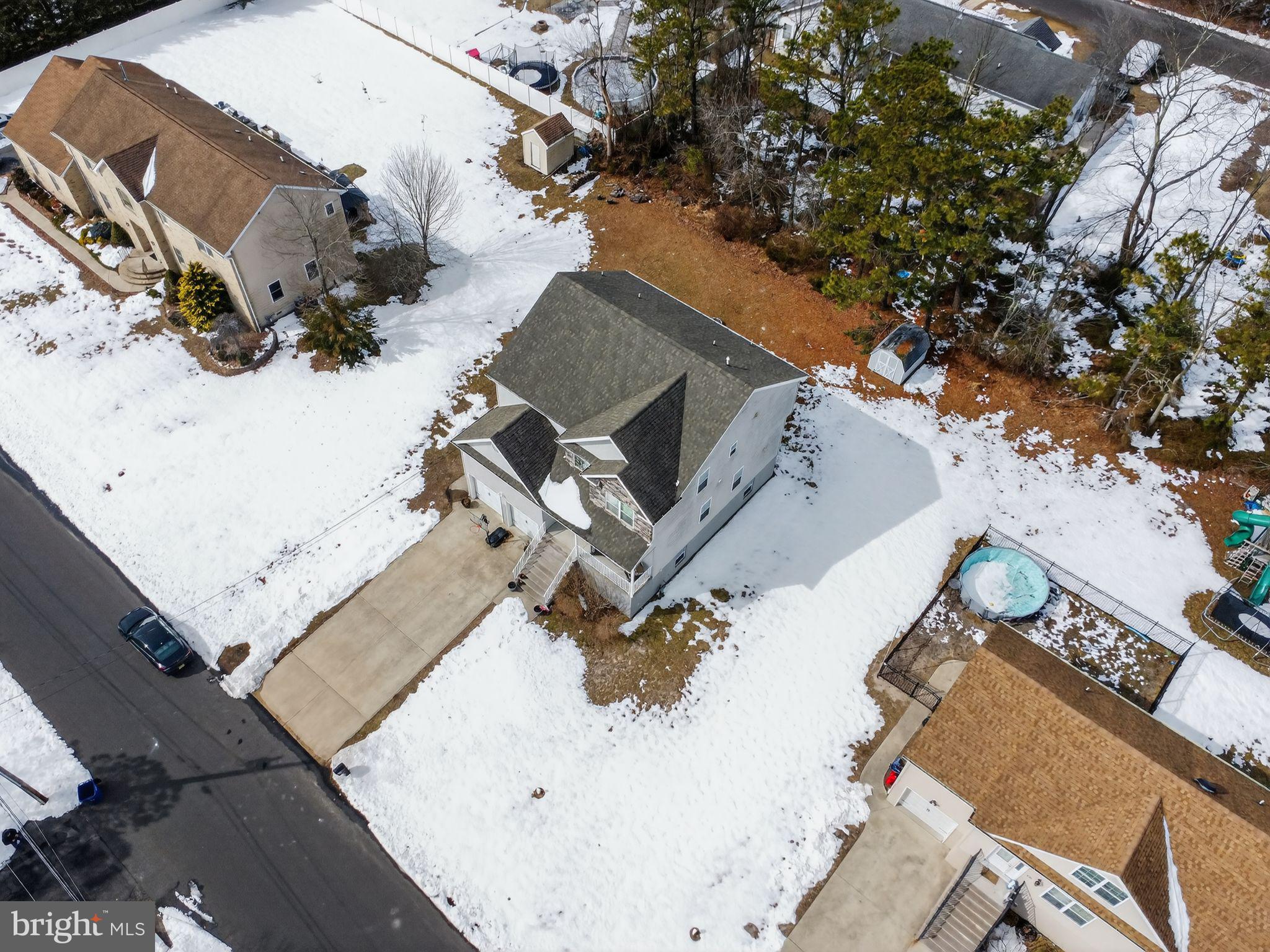 95 Savannah Road Manchester Township, NJ 08757 - Photo 37 of 37 an aerial view of a house with a yard