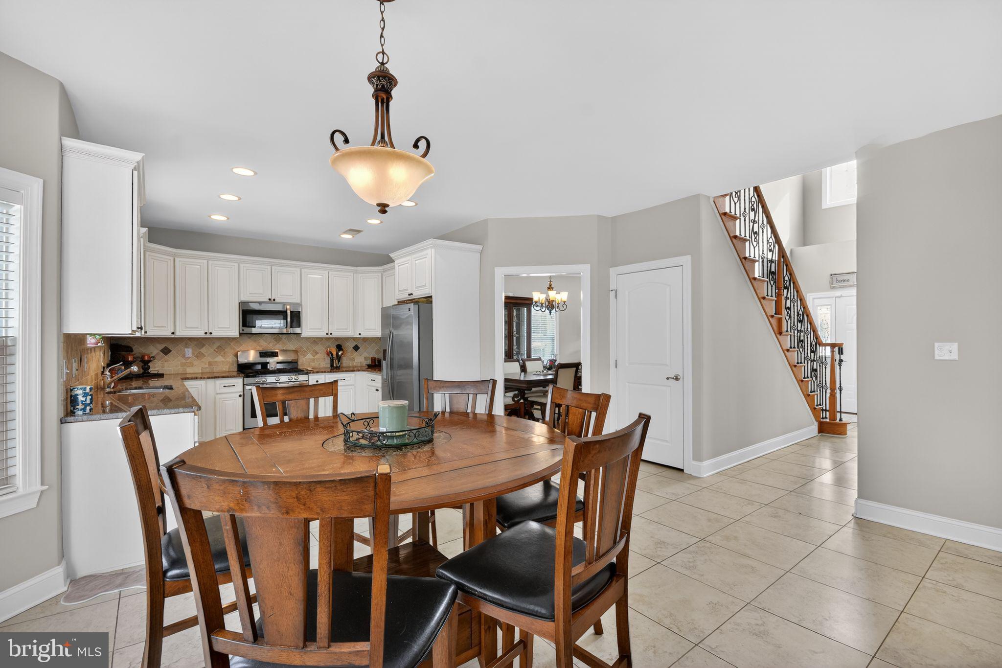 95 Savannah Road Manchester Township, NJ 08757 - Photo 9 of 37 a view of a dining room with furniture