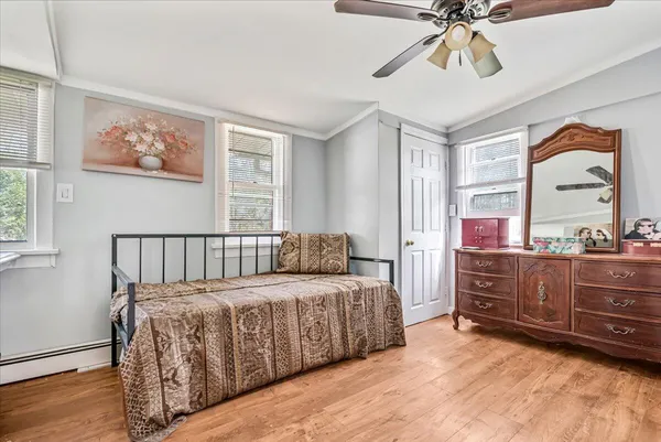 a bedroom with a bed and a closet