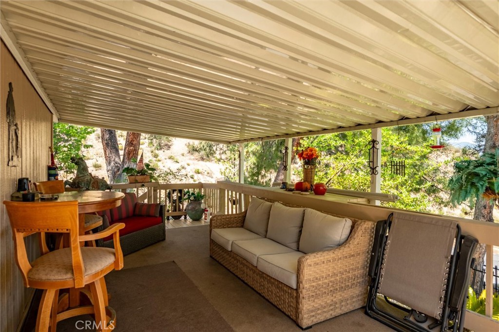 35109 Highway 79, Unit 116 Warner Springs, CA 92086 - Photo 16 of 72 a outdoor living space with furniture and garden view