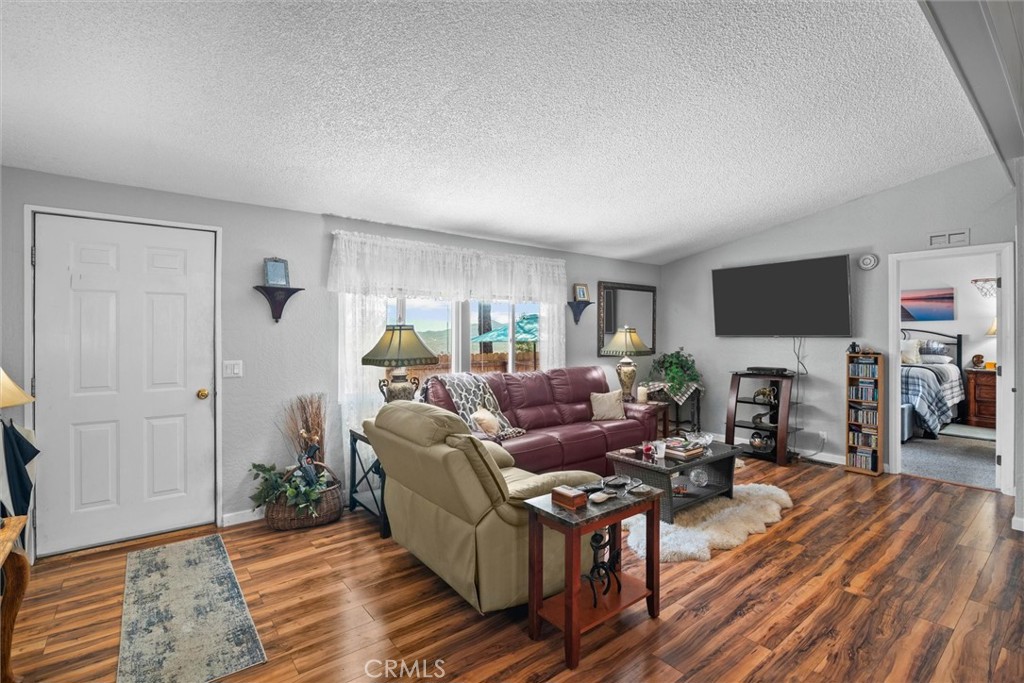 35109 Highway 79, Unit 116 Warner Springs, CA 92086 - Photo 20 of 72 a living room with furniture and a flat screen tv