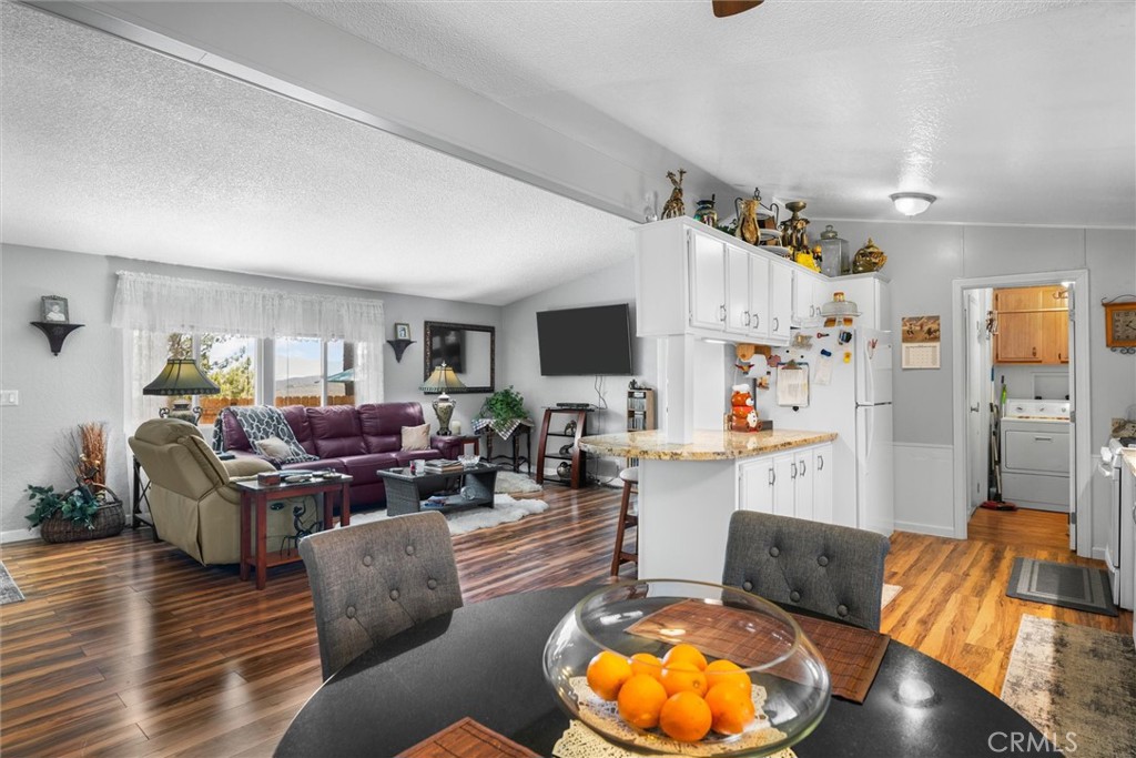 35109 Highway 79, Unit 116 Warner Springs, CA 92086 - Photo 27 of 72 a living room with furniture and a flat screen tv