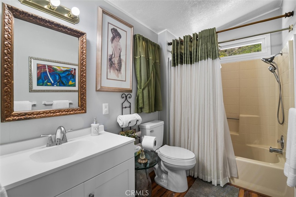35109 Highway 79, Unit 116 Warner Springs, CA 92086 - Photo 33 of 72 a bathroom with a sink a toilet and shower