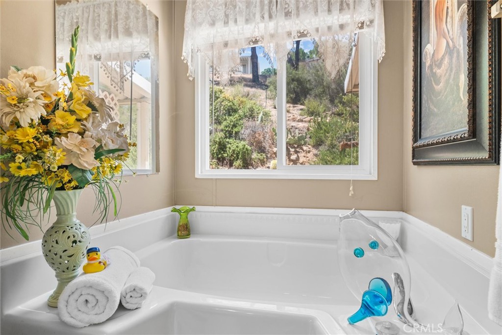 35109 Highway 79, Unit 116 Warner Springs, CA 92086 - Photo 46 of 72 a bathroom with a bathtub and a shower
