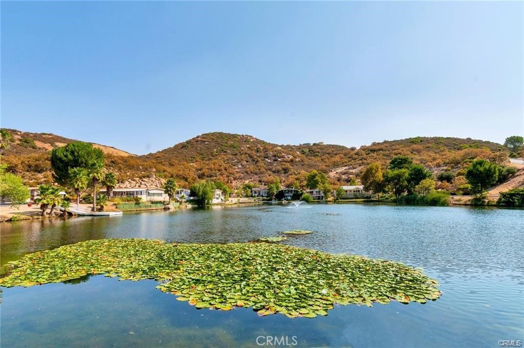 35109 Highway 79, Unit 116 Warner Springs, CA 92086 - Photo 70 of 72 a view of a lake with houses in the back