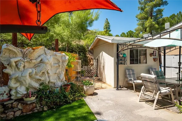 a view of storage and utility room with washer and dryer