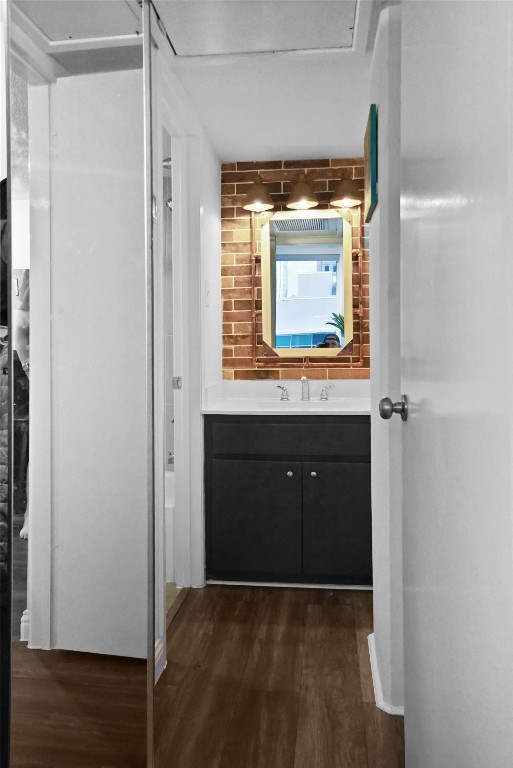 1212 Guadalupe Street, Unit 402 Austin, TX 78701 - Photo 16 of 20 a view of hallway with a sink and a mirror