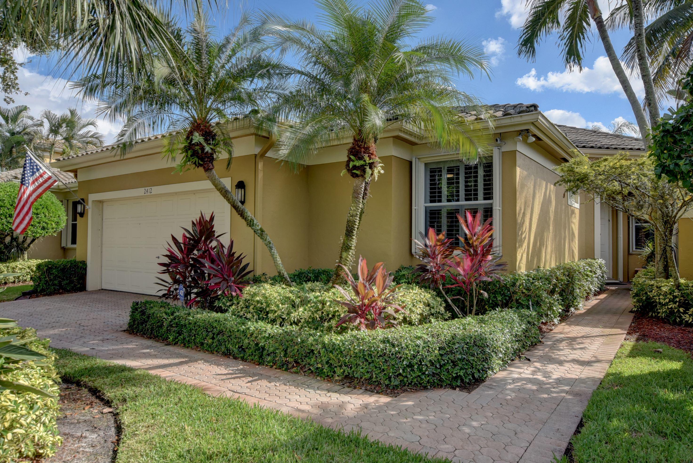 2412 Northwest 67th Street Boca Raton, FL 33496 - Photo 1 of 28 side entrance
