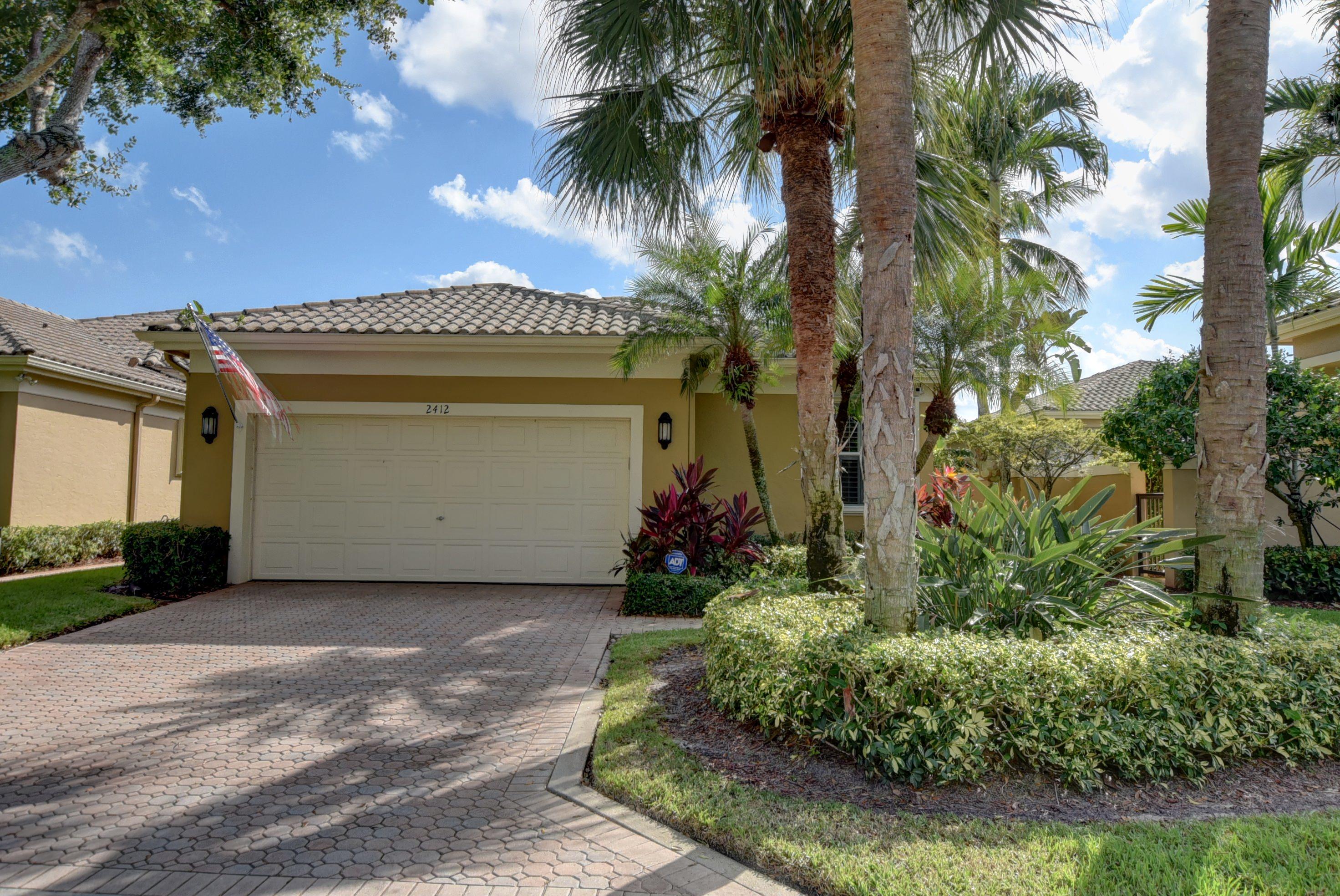 2412 Northwest 67th Street Boca Raton, FL 33496 - Photo 2 of 28 front